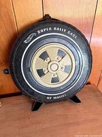 Front of tire-shaped Hot Wheels Super Rally Case