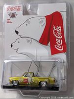 Front view of sealed package showing truck and polar bear artwork