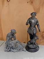 Both spelter figures side by side