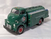 Front three-quarter view of green BA Gas Oil die-cast tanker truck