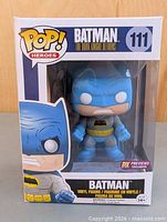 Front of boxed Batman Funko Pop showing figure and branding