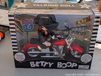 Front of boxed Betty Boop Route 66 talking doll and motorcycle set