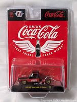 Front of sealed blister package showing full card and truck