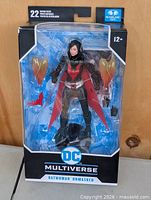 Front view of sealed Batwoman Unmasked figure in original packaging