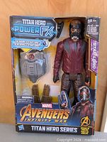 Front view of boxed Star-Lord Titan Hero figure and accessory