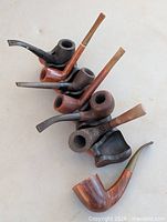 Entire set of seven pipes displayed in stand