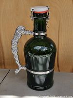 Full side view showing handle and stopper