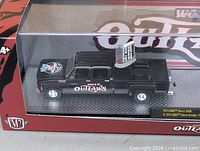 Boxed set front view showing both trucks and branding