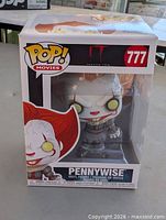 Front view of boxed Pennywise Funko Pop figure