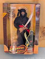 Front view of sealed Cairo Swordsman figure in box
