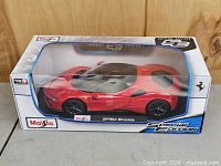 Boxed 1:18 scale Ferrari SF90 Stradale model