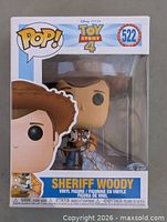 Front of boxed Funko Pop showing figure and graphics