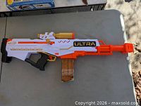 Full view of Nerf Ultra Pharaoh blaster on table