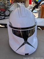 Front view of white plastic stormtrooper helmet