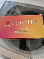 Closed Aurelia mask box showing branding and Made in Canada maple leaf