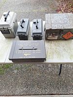 All five storage containers displayed on table