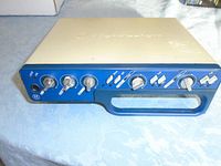 Front panel of Digidesign Mbox 2 showing gain knobs, mix knob, headphone jack