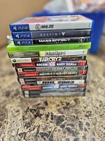 Stacked side view of all game spines showing platform mix and titles