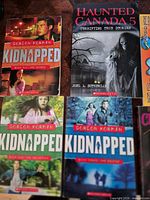 Kidnapped trilogy and Haunted Canada book grouped