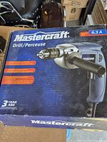 Retail box showing Mastercraft 1/2 in. 6.3 A drill image and specs