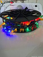 Reel with multicoloured LED lights illuminated