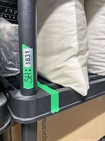 Close-up of shelf corner post and shelf surface