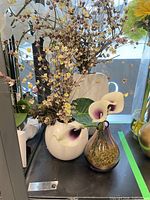 All three vases with faux arrangements shown together