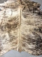 Full view of brindle cowhide rug