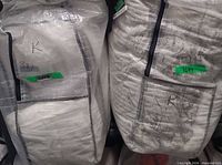 Two packaged duvet inserts marked king