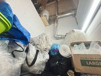 Overall view of assorted packing materials on shelf