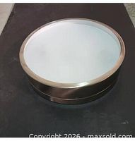 Single dome ceiling light fixture showing brushed nickel rim and frosted glass diffuser