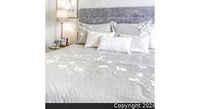 Queen greige leaf-pattern duvet staged on bed