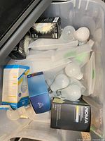 LED bulbs boxed and foam wrapped in bin