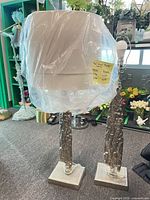 full view of both lamps with shades wrapped in plastic