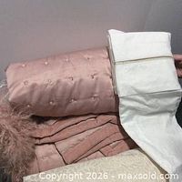 Blush quilted coverlet, fur accent pillow, folded shams