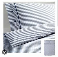 Reference image showing blue and white striped duvet cover and sham