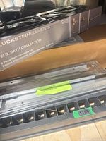 Boxed GlucksteinElements Felix Bath Collection kit and additional packaged hardware visible