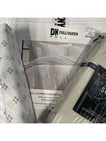 DKNY Pure comforter set packaging, sheet set and toss cushion visible