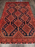 Full view of entire rug showing overall pattern and borders