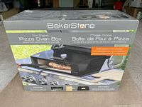 Front of sealed BakerStone Pizza Oven Box retail package