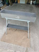 Front perspective of complete WillBBQ Spieducci grill on stand