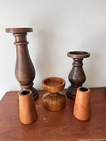 Front view all five candleholders showing size variety