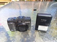Camera front and charger with battery