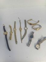 All nine wristwatches laid out for overall view
