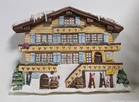Front view of entire alpine ski lodge wall plaque