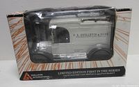 Front of boxed model showing van and branding
