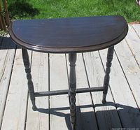 Full view of demilune table on deck