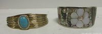 Front view of both bracelets showing design details