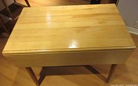 Maple table, leaves down, showing top and front