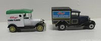 Side view of both Kellogg’s vans